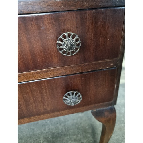 627 - A good 1950's writing desk with fold out writing slope, pigeon holes and two drawers with brass pull... 