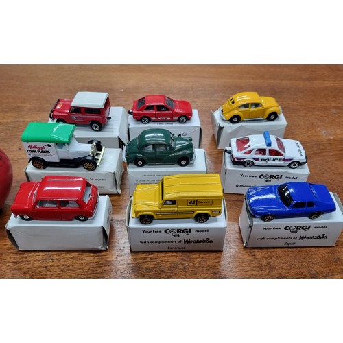 714 - A collection of nine boxed vintage Corgi model toy cars.