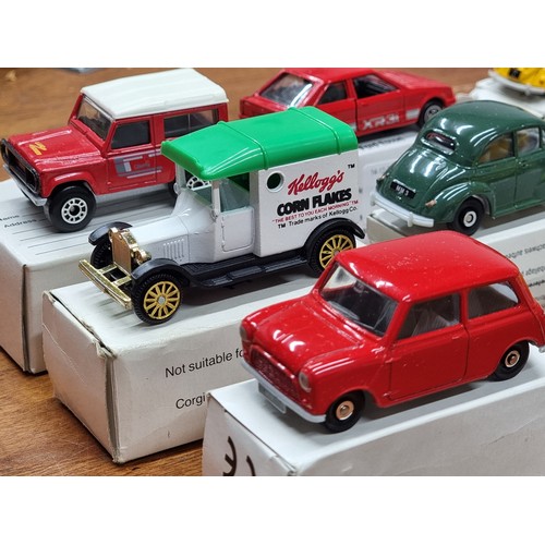 714 - A collection of nine boxed vintage Corgi model toy cars.