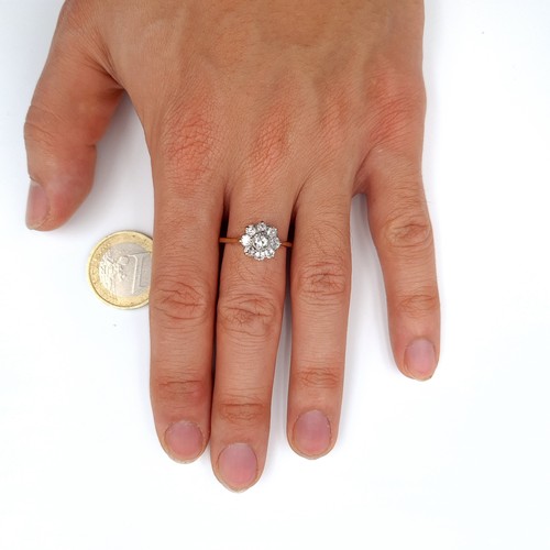 1 - Star Lot : An important diamond cluster ring monted in an 18k gold band (stamped 18K), total weight ... 