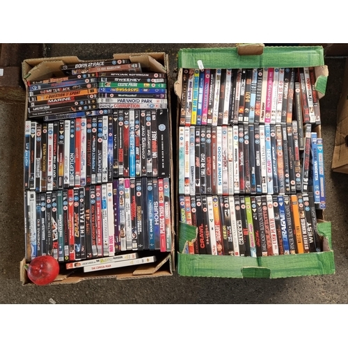 838 - Two crates filled with a large number of DVDs including 