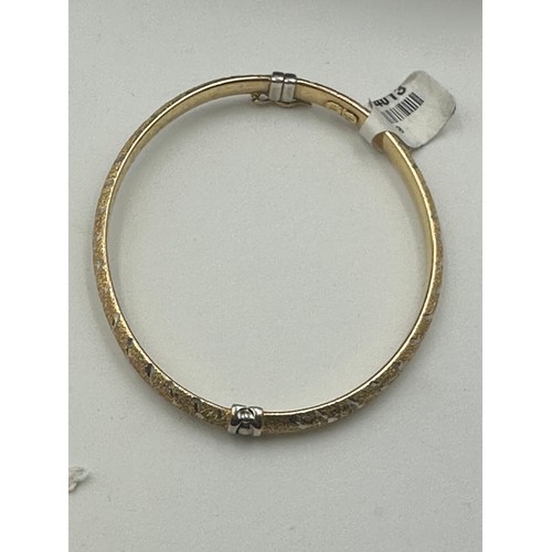 44 - Star Lot; A brand new heavy 9ct gold bangle 7.78 G with tags.