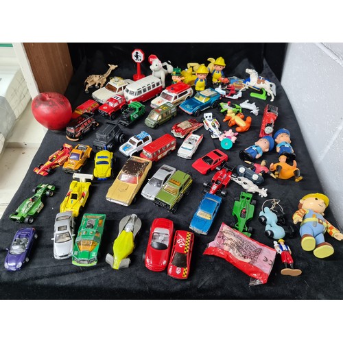 727 - A large collection of model cars and toys including diecast Matchbox examples. Along with figurines ... 