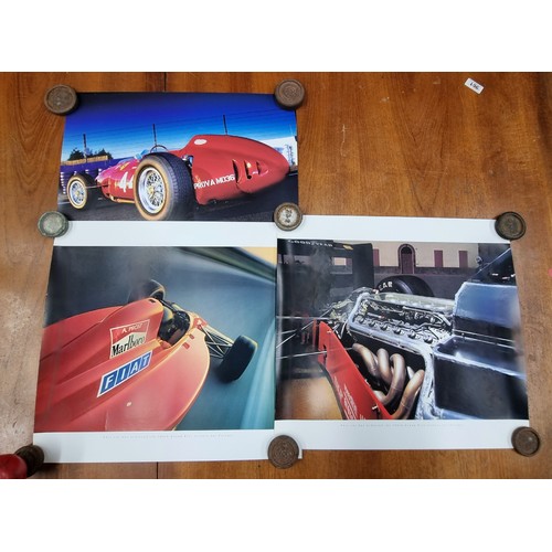 244 - Five prints of motor interest including a vintage A2 sized printed poster featuring Ferrari F1 drive... 