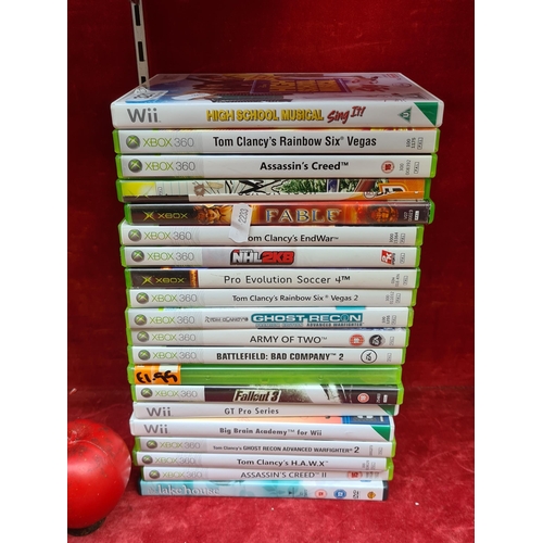 321 - A collection of 20 Xbox 360 and Wii games.