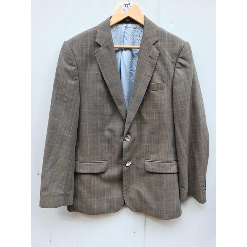 335 - A handsome men's Magee wool blend blazer, exuding classic charm with its fitted cut and distinguishe... 