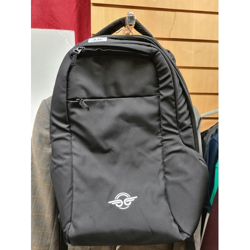 336 - A stylish black Bird backpack, perfect for daily use, featuring multiple internal and external compa... 