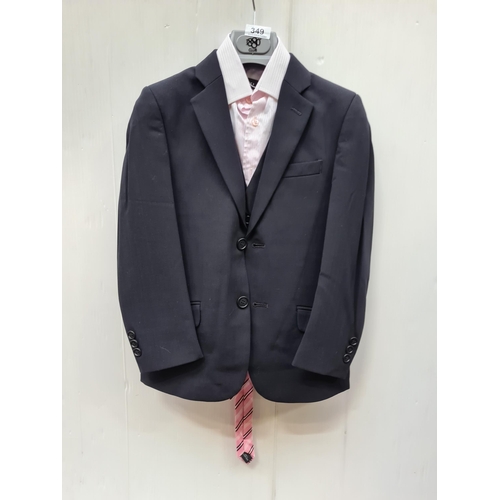 349 - Timeless navy men's suit jacket, complete with a pink dress shirt and a complementing striped tie. T... 