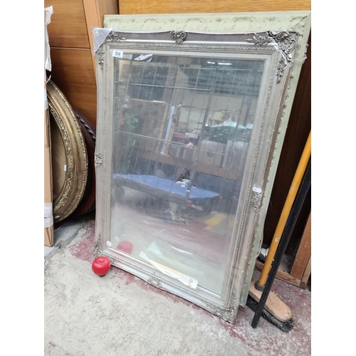 354 - A brand new bevelled Elegant silver-framed mirror, with ornate rococo-style detailing, perfect for a... 