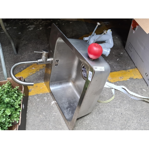 372 - A stainless steel Sink, for commercial use with a mixer tap and plumbing.