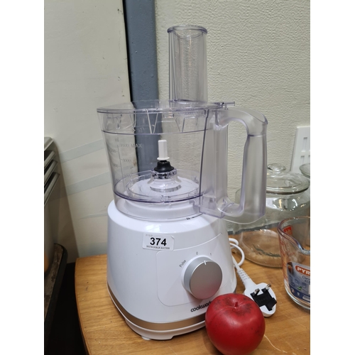 374 - A Cookworks 1.4L two speed food processor , chops, slice or shreds with original box and accessories... 