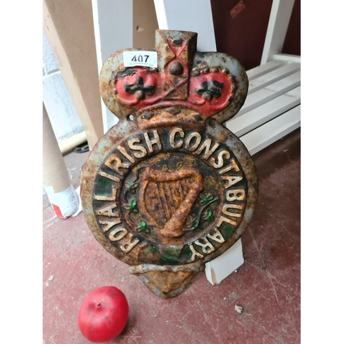 407 - A vintage style Royal Irish Constabulary Station badge, Cast metal and very heavy.