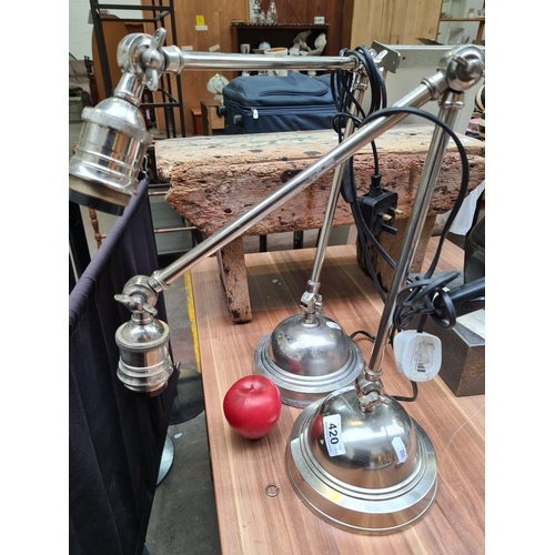 420 - A pair of vintage-style, articulated industrial lamps in polished metal.