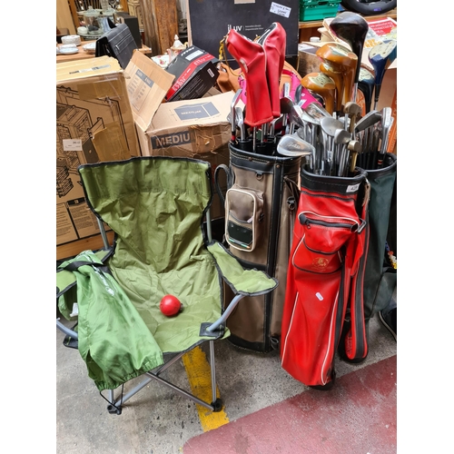 429 - Three Vintage golf bags 1970s-1980s With sets of Clubs and some nice woods. and a Folding camping ch... 