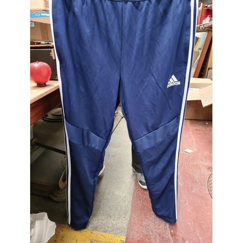 432 - A pair of Brand new with tags  Adidas track pants,  size M