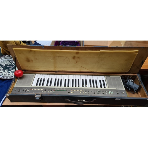 436 - Vintage Yamaha SS-30 String Synthesizer in original case, evoking nostalgic melodies of the 1970s. W... 