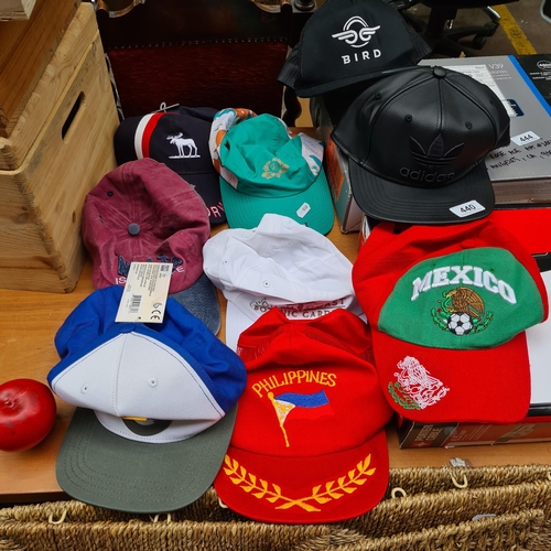 440 - A great assortment of 9 branded caps, Including new caps with tags from Adidas etc. Missing these, t... 