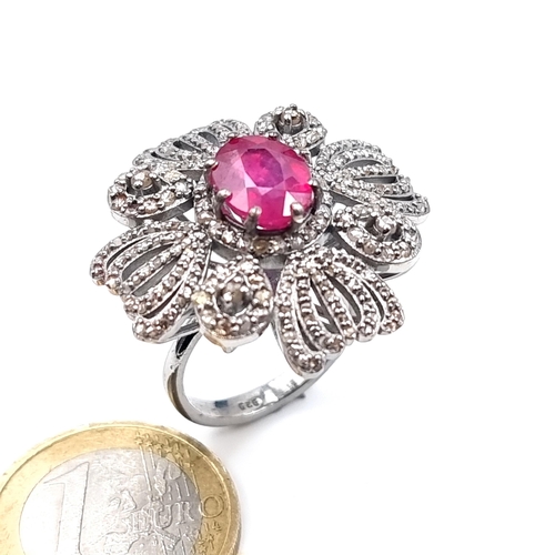 504 - Star Lot : A beautiful ruby ring mounted in ruby surrounded by diamonds, weight of ruby 4.1 cts, dia... 