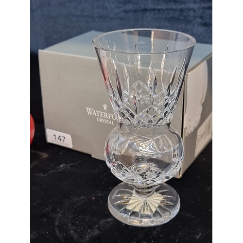 147 - An as new Waterford Crystal thistle vase in the Lismore pattern. With original box.