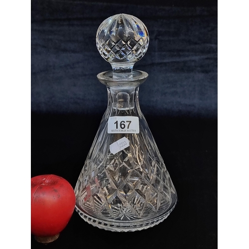 167 - A timeless Waterford Crystal decanter in the Lismore pattern. Good condition aside from very tiny lo... 