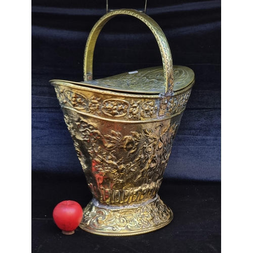 170 - Star Let : A beautiful antique brass embossed coal scuttle boasting a rich foliate motif in relief, ... 