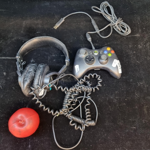 180 - An XBox 360 controller along with a pair of Sony Dynamic professional Stereo headphones model MDR-75... 