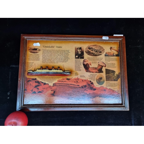 187 - A wooden commemorative plaque with information on the Titanic ship. Featuring a model of the ship in... 