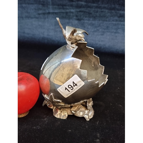 194 - A fabulous Victorian silver plated spoon warmer in the form of a large egg.