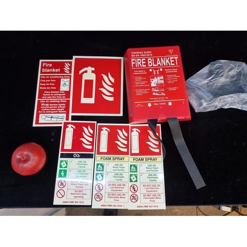 199 - An emergency fire blanket in case accompanied by wall fittings and instructions for use of blanket a... 