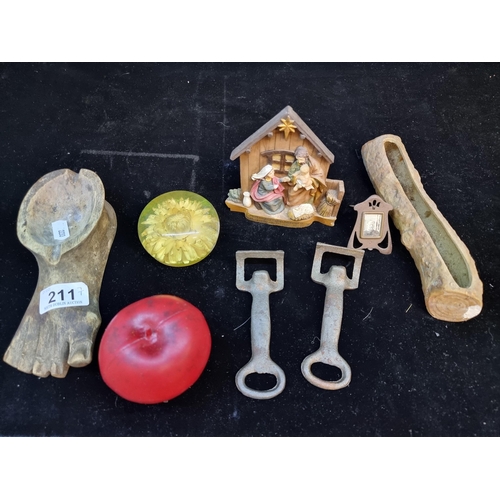 211 - A selection of 7 items including a neatly sized art nouveau photo frame, a Nativity Scene, a brillia... 