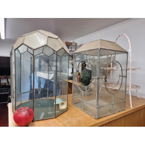 212 - Two lovely vintage glass terrarium displays including one with hexagonal panels and doors with anoth... 