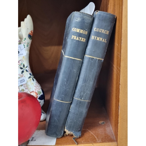 229 - Two antique ecclesiastical themed hardback books titled Woodbrook, 1906 