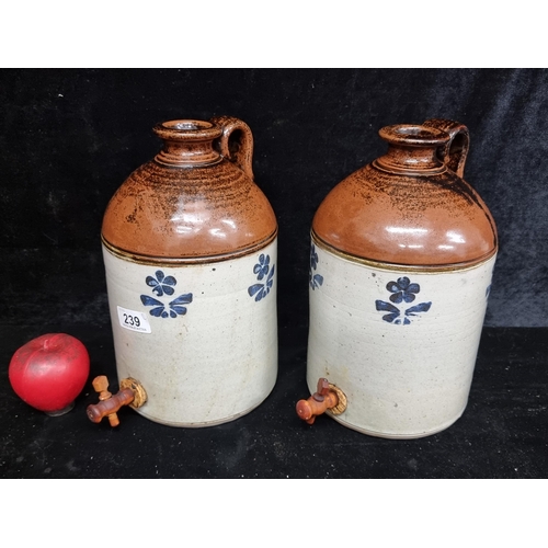 239 - A pair of vintage American two tone stoneware crocks with taps. In very good condition.