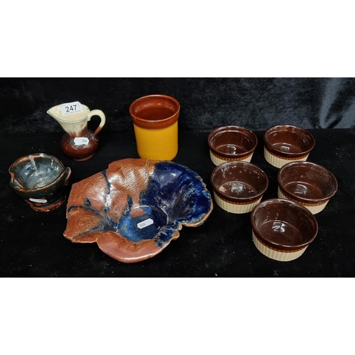 247 - Nine pieces of ceramics and studio pottery including jug, bowl and vase.