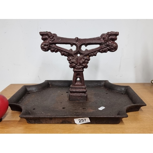 257 - Star Lot A large vintage cast iron boot scraper. Its a beauty.