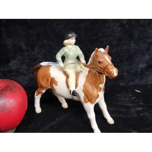 262 - A rare vintage Beswick ceramic figure of a rider on a horse. In very good condition. Similar on Ebay... 