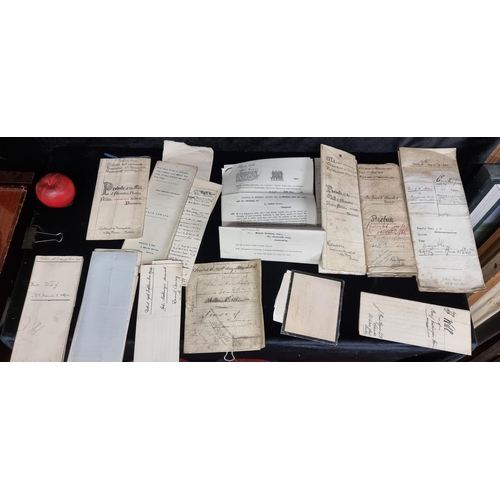 268 - A selection of antique and vintage historical ephemera including wills and lease documents relating ... 