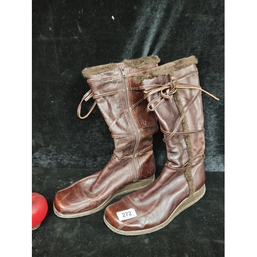 272 - A pair of brown Oasis boots in a brown leather finish with strap detailing and zippers to sizes. In ... 