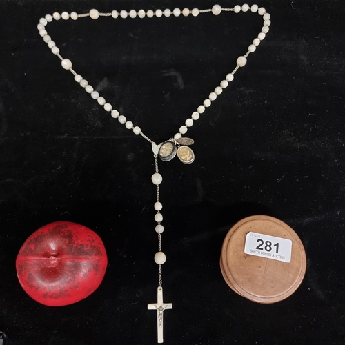 281 - Star Lot: Beautiful 19th century rosary beads featuring two reliquary pendants with one containing r... 