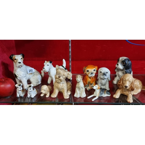 292 - An absolutely charming collection of 11 ceramic dog figurines. Featuring 3 Sylvac examples.