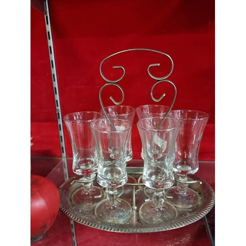 294 - A sophisticated set of 6 aperitif glasses with silver plated carrier tray.