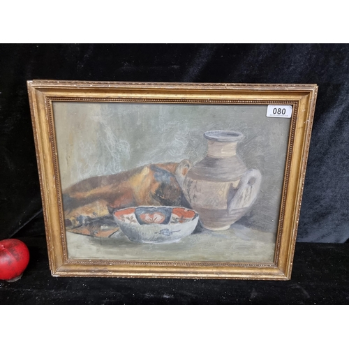 80 - An original oil on paper painting featuring a still life of bowl and jug. Housed in a gilt frame beh... 