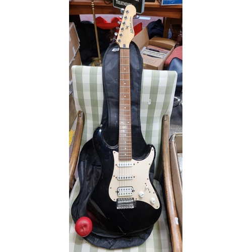 483 - A fab Yamaha EG012 electric guitar. Features an Alder wood body and Maple wood neck. Includes case. ... 