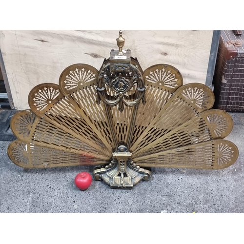 485 - Star Lot : A vintage solid brass peacock fan fire screen. A beautiful example featuring neo classica... 