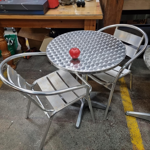 491 - A stainless steel Bolero round cafe / bistro table and two chairs. A great little outdoor dining set... 