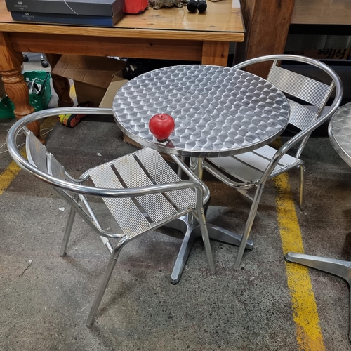 492 - A stainless steel Bolero round cafe / bistro table and two chairs. A great little outdoor dining set... 