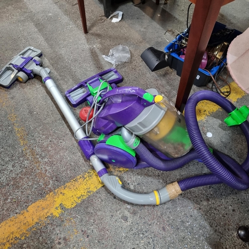 494 - A Dyson DC05 dual cyclone Absolute Turbo Brush vacuum cleaner / Hoover. Comes with two brush head at... 