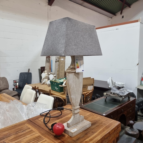 611 - A stylish contemporary Coach House wooden table lamp in the form of an urn.