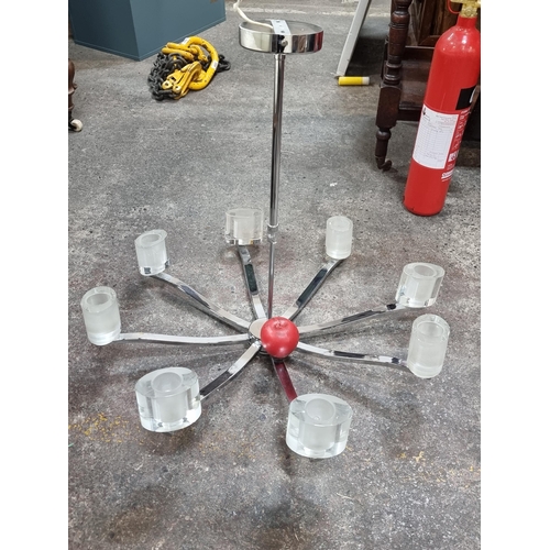 621 - Star lot: A fabulous contemporary large eight branch chandelier with think glass holders and a heavy... 