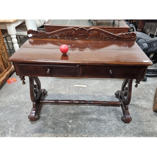 629 - A superb Victorian Mahogany gallery back two drawer sideboard with Ornate stretcher and beautifully ... 